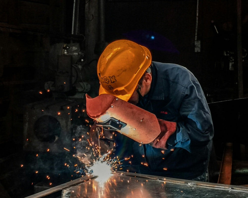 Welding worker sparks